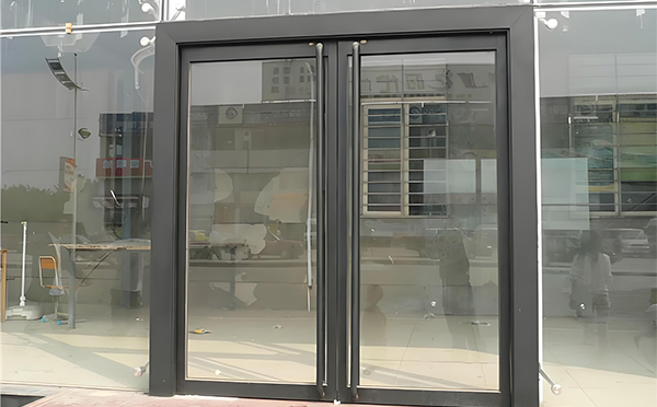 白银玻璃地弹门